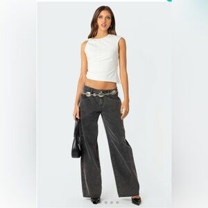 Trendy White Sleeveless Top and Black Wide-Leg Jeans